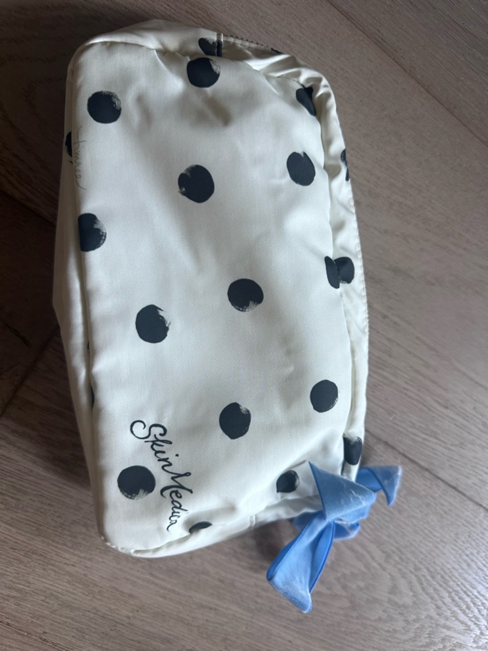 SkinMedica Ivory Cosmetic Pouch with Black Polka Dots and Blue Ribbon